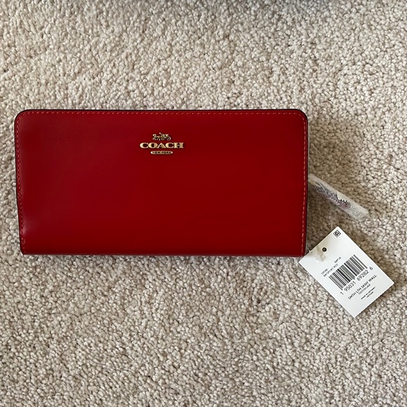 Coach Handbags - COACH - skinny wallet in red